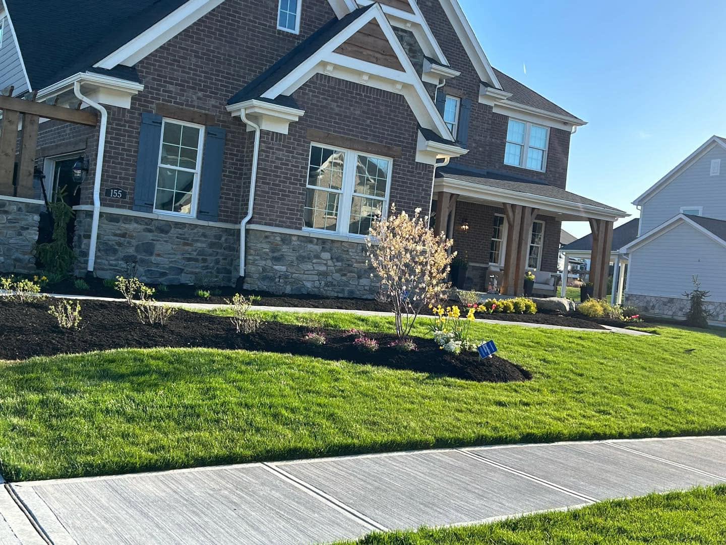 Front yard landscaping and fresh sod at an Indianapolis home